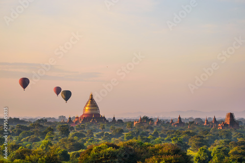 Sunrise over Bagan, Myanmar, balloons with temples in the Archaeological Park, Burma