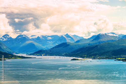 Aerial day view of beautiful fjord with snowy mountains in summer in Molde, Norway