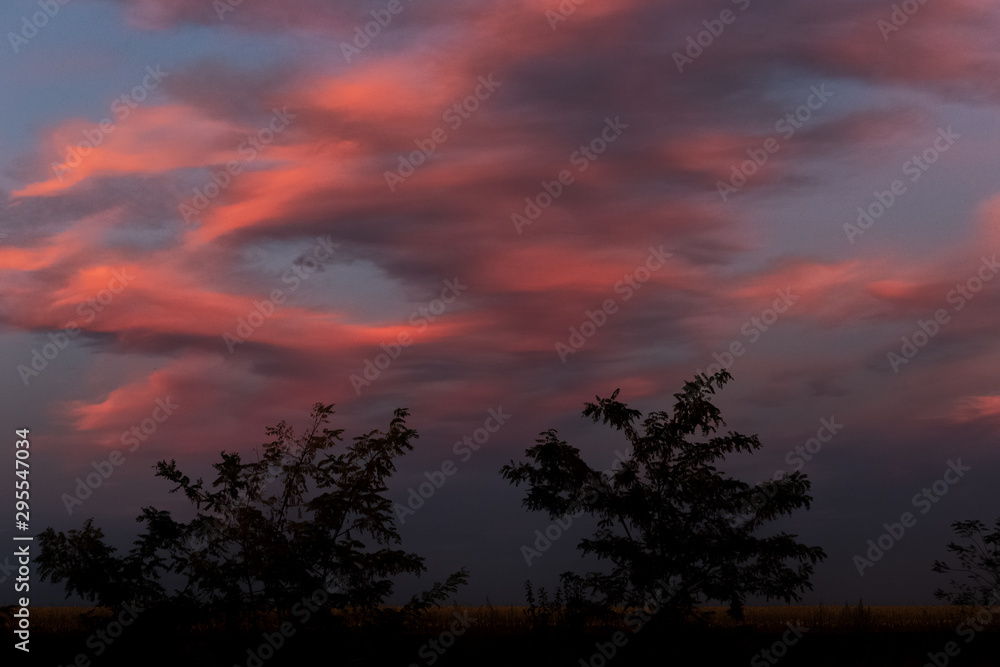 Landscape of beautiful sky with clouds at october sunset.