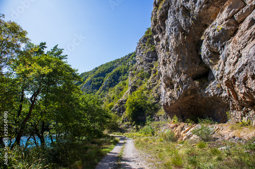Footpath next to the rocks and mountains and Una river in village Martin Brod in Bosnia and Herzegovina