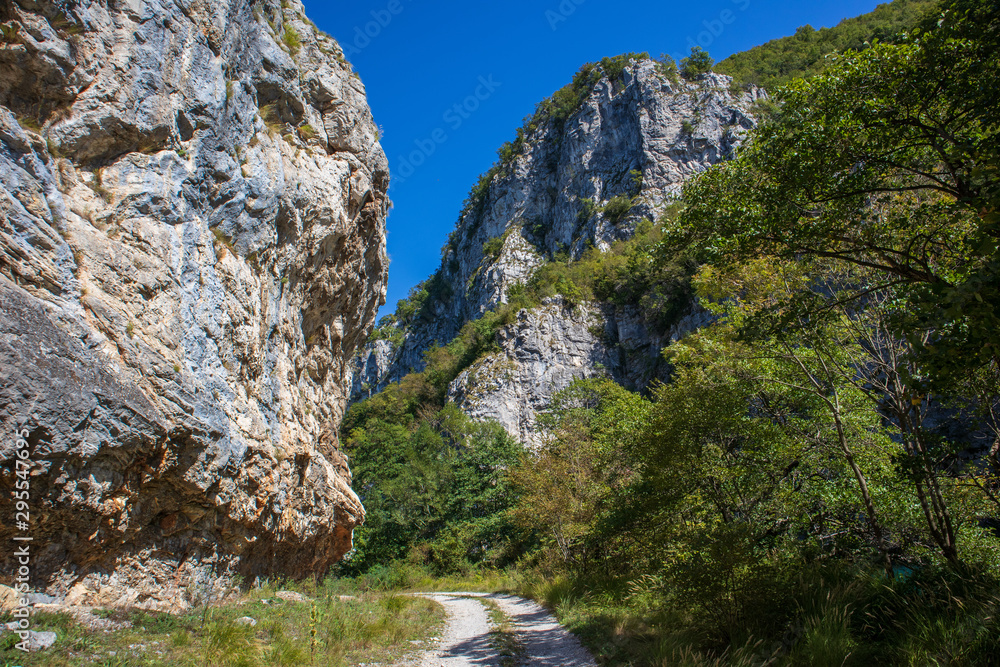 Footpath next to the rocks and mountains and Una river in village Martin Brod in Bosnia and Herzegovina Footpath next to the rocks and mountains and Una river in village Martin Brod in Bosnia and Herzegovina