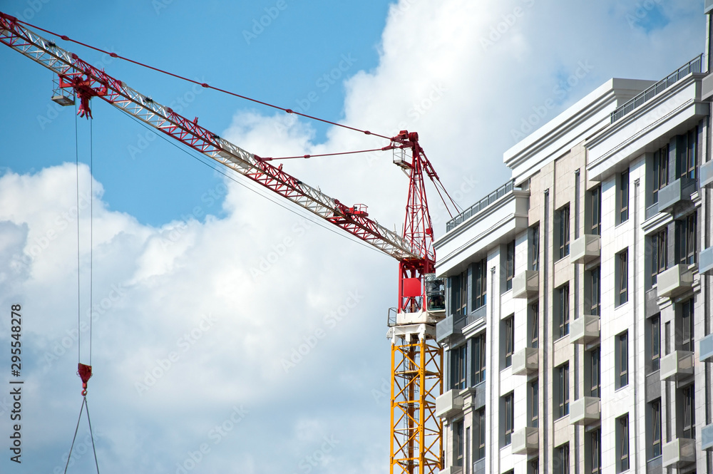 Crane and highrise construction site