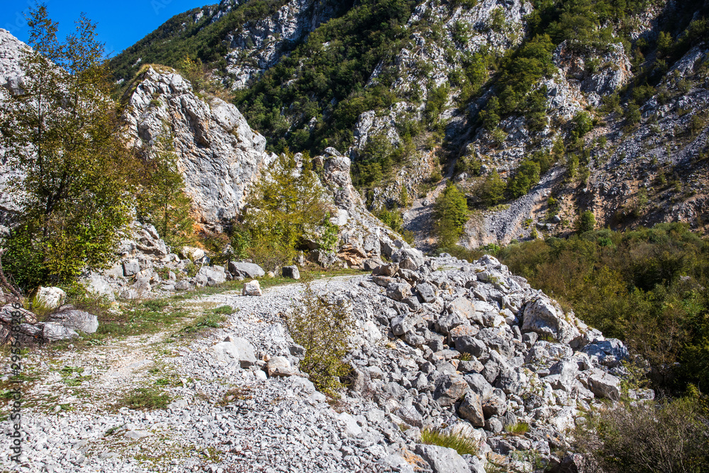 Footpath next to the rocks and mountains and Una river in village Martin Brod in Bosnia and Herzegovina