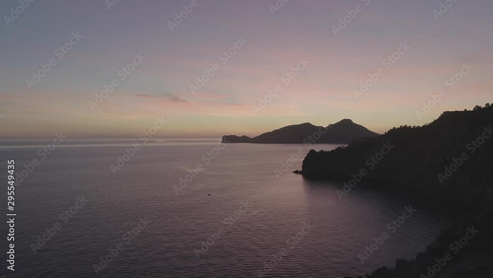 Wonderful filming, aerial video of a beautiful sunset on cliffs in the sea, of the island of mallorca Wonderful filming, aerial video of a beautiful sunset on cliffs in the sea, of the island of mallorca