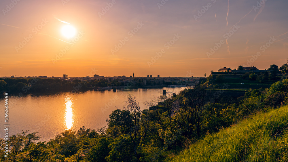 sunset over river sunset over river