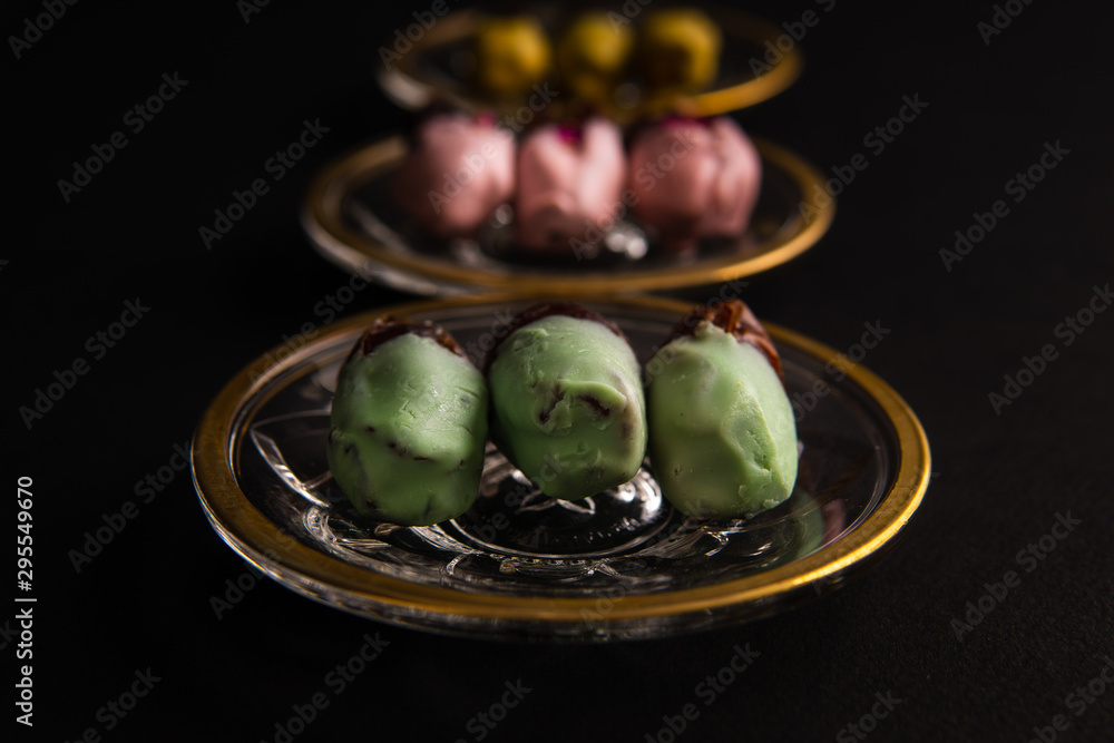 various dates on shiny crystal plates with golden design various dates on shiny crystal plates with golden design