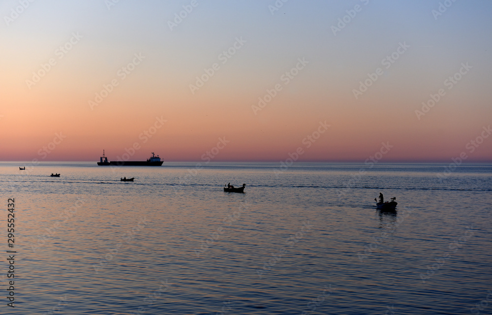 fishing at sunset