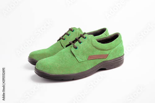 Male green leather shoe on white background, isolated product.