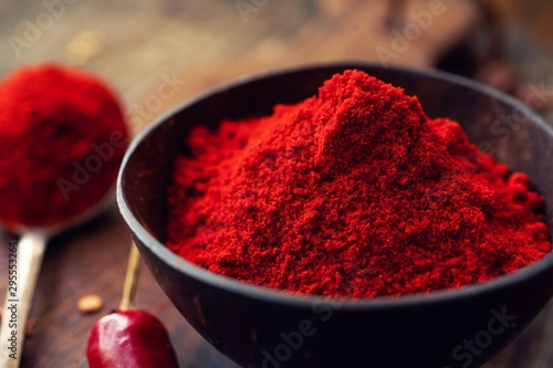 Wall Mural Close up still life of red chilli powder, selective focus