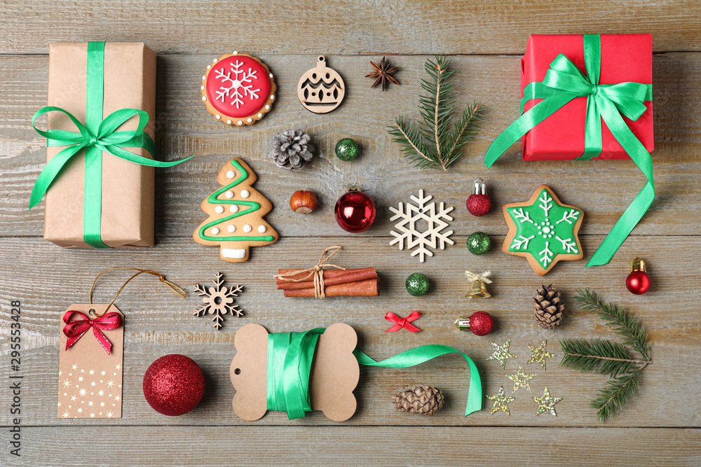 Flat lay composition with Christmas gifts on wooden background