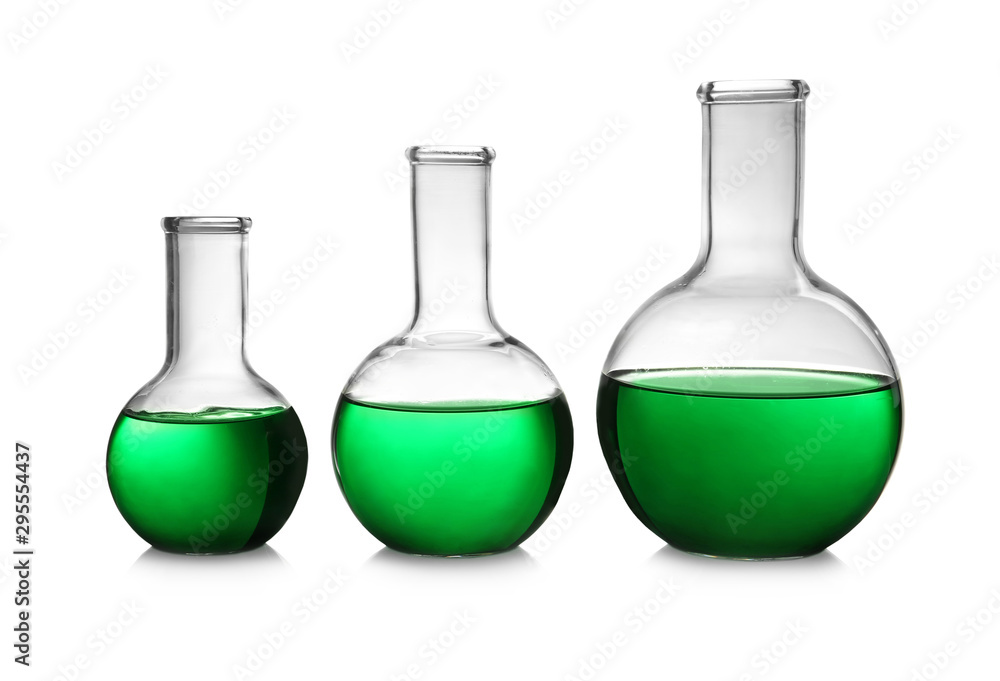 Florence flasks with green liquid on white background Florence flasks with green liquid on white background