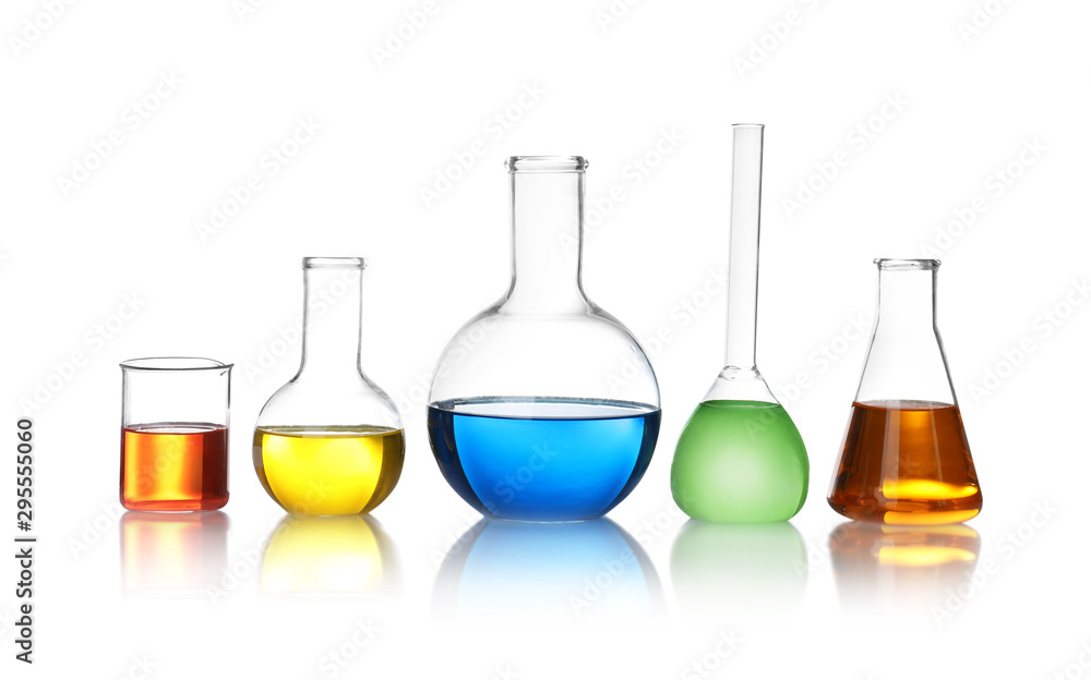 Laboratory glassware with color liquids on white background - obrazy, fototapety, plakaty 
