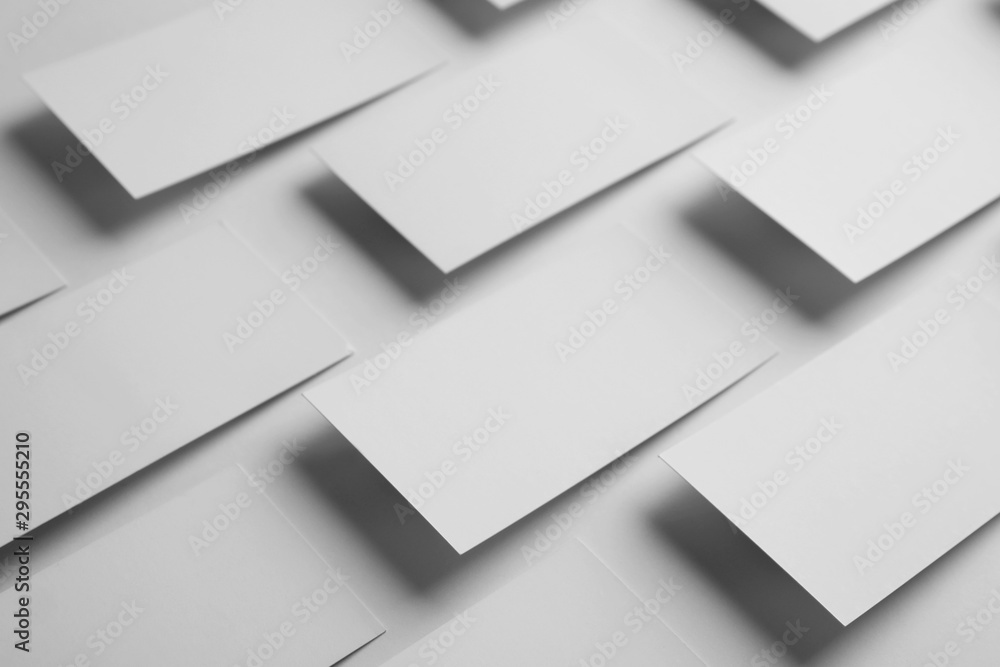 Blank business cards on white background. Mock up for design Blank business cards on white background. Mock up for design