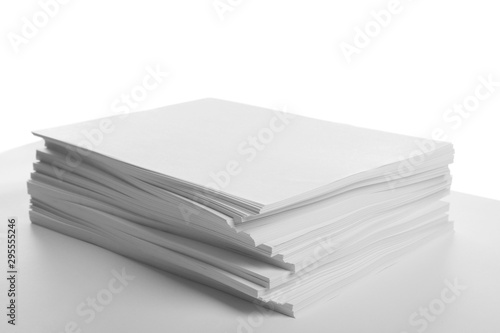 Stack of blank papers on white background