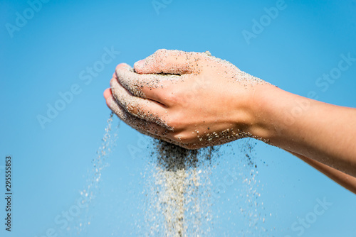 Sand through hands