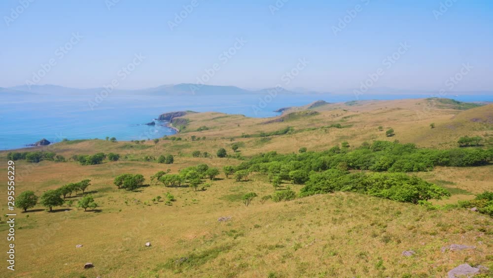 Beautiful landscape. Panoramic video on green meadows and turquoise sea. Russian open spaces Beautiful landscape. Panoramic video on green meadows and turquoise sea. Russian open spaces