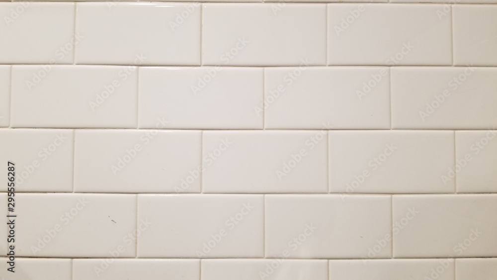 Naklejka premium background of white tile wall