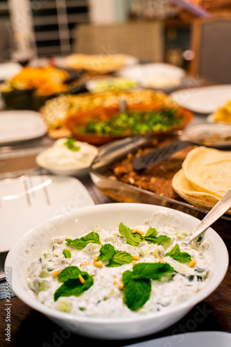 Some lebanese food like salads or flat bread with goat cheese