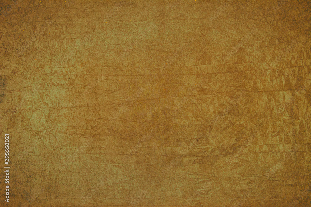 Background of ocher color on rough surface Background of ocher color on rough surface