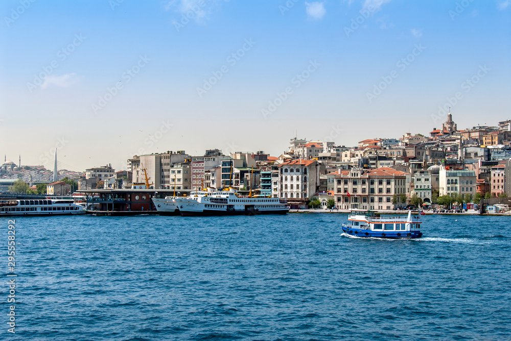 Istanbul, Turkey, 29 June 2019: Karakoy Galata Port and city ​​lines ships.