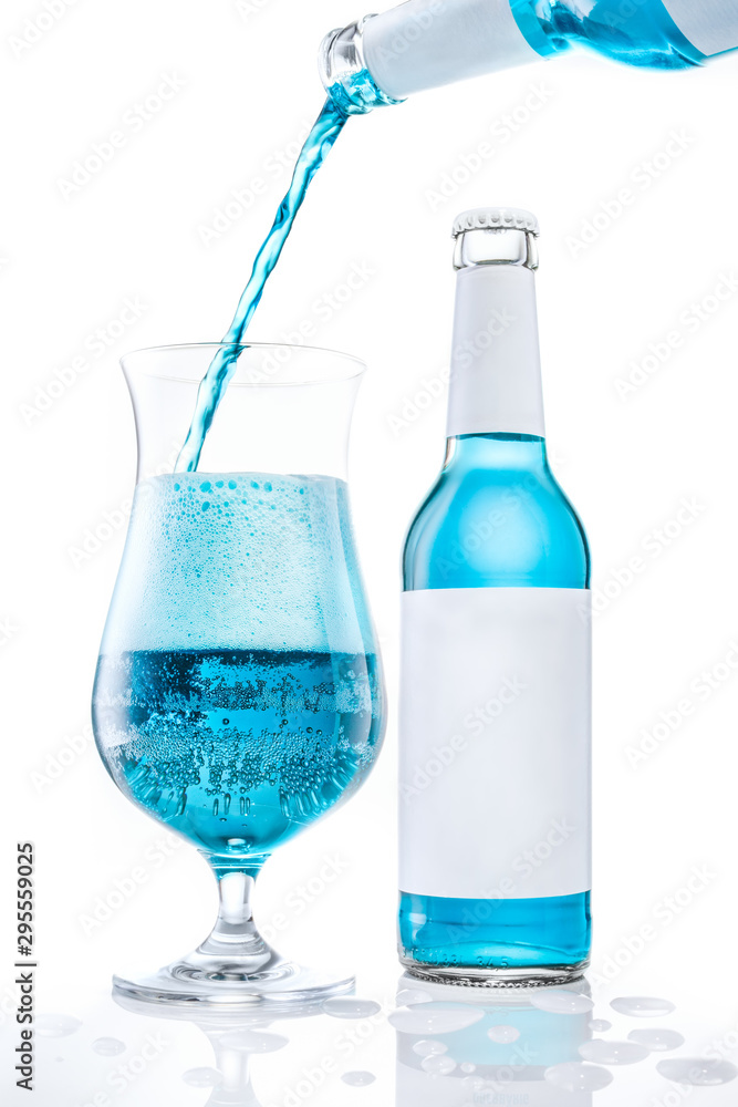 Exotic beer mix drink pouring in a glass. White background Exotic beer mix drink pouring in a glass. White background