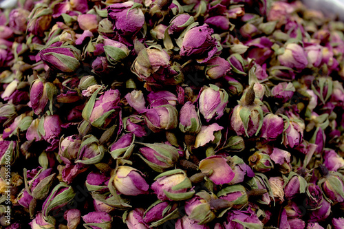 Pattern of dried pink roses close-up. Dry roses.