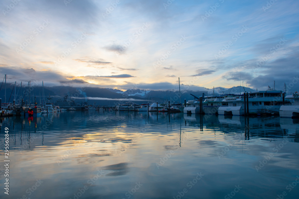 Seward Boat Harbor and waterfront in fall, Seward, Kenai Peninsula, Alaska, AK, USA. Seward is a city near Kenai Fjords National Park. Seward Boat Harbor and waterfront in fall, Seward, Kenai Peninsula, Alaska, AK, USA. Seward is a city near Kenai Fjords National Park.