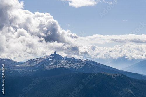 blackcomb mountain peak panorama view cloudy sky summer time.