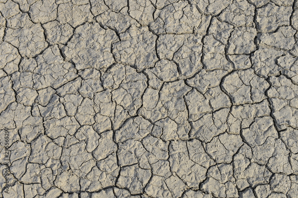 dry season with very arid terrain and little water broken soil virtually no vegetation dry season with very arid terrain and little water broken soil virtually no vegetation