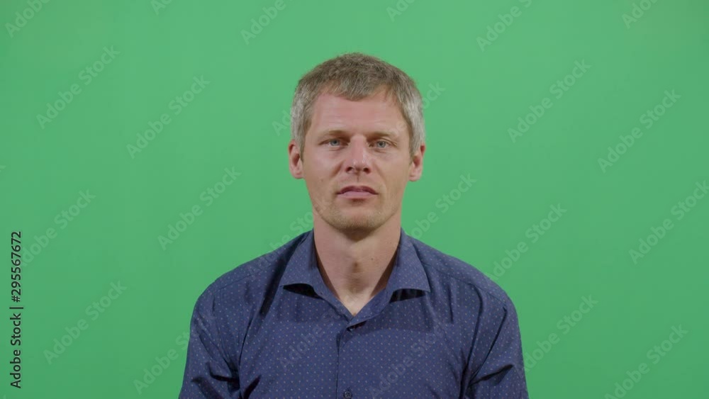 Adult Man Pulling His Ears. Studio Isolated Shot Against Green Screen Background Adult Man Pulling His Ears. Studio Isolated Shot Against Green Screen Background