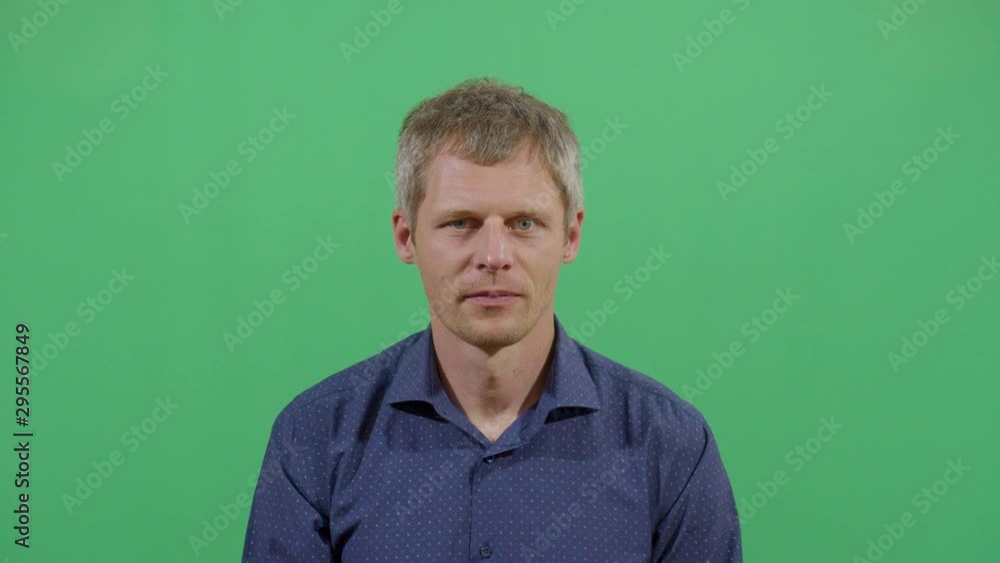Adult Man Blowing His Brains Out With Hand Like Gun. Studio Isolated Shot Against Green Screen Background Adult Man Blowing His Brains Out With Hand Like Gun. Studio Isolated Shot Against Green Screen Background