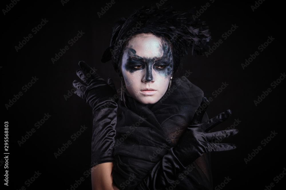 Halloween photo shoot Day of the dead on a black background with in the studio. Halloween photo shoot Day of the dead on a black background with in the studio.