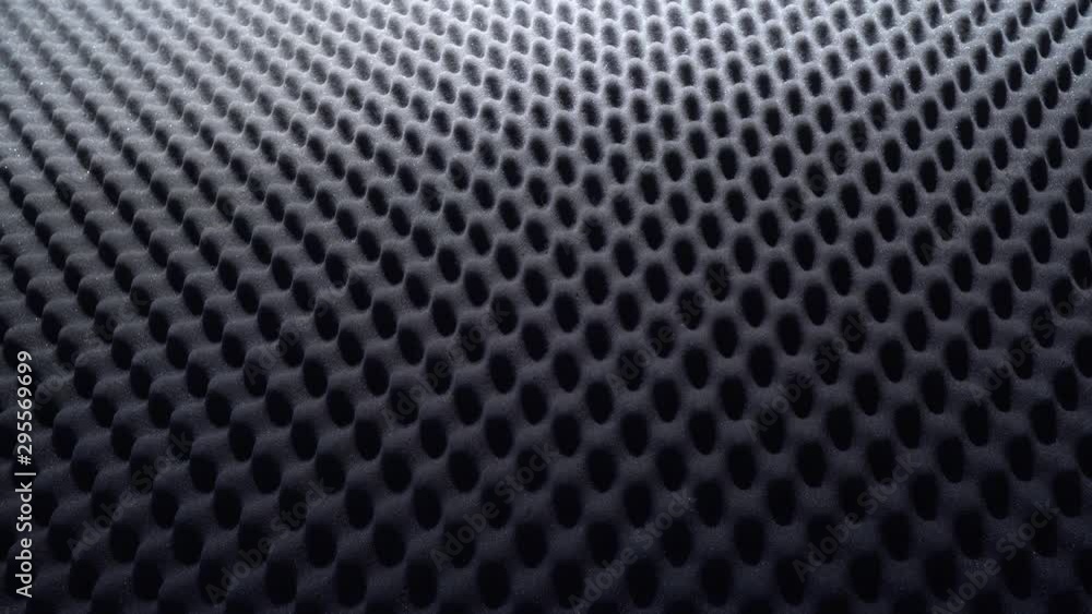 Seamless looping geometric background made with acoustic foam and creative lighting Seamless looping geometric background made with acoustic foam and creative lighting