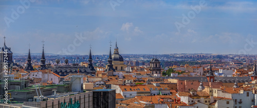 Aerial view of the Madrid cityscape and Almudena Cathedral rooftops in the city center Madrid, Spain
