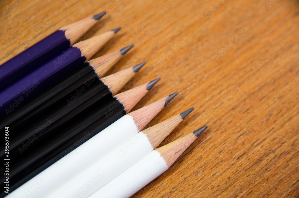 Obraz premium pencil on wooden table with space on side view