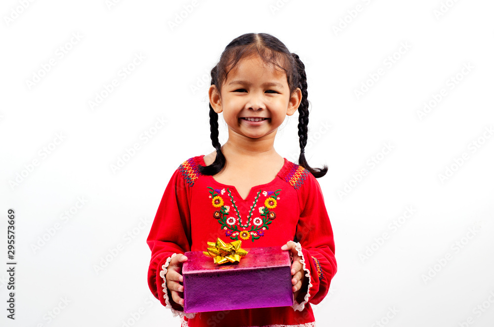 Asian Baby girl holding gift box for christmas and happy new year concept Asian Baby girl holding gift box for christmas and happy new year concept