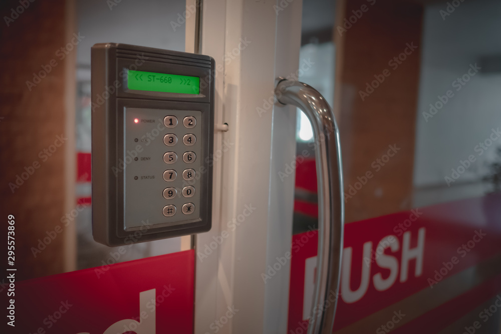 Selective focus Magnetic door locking system install on glass door Selective focus Magnetic door locking system install on glass door