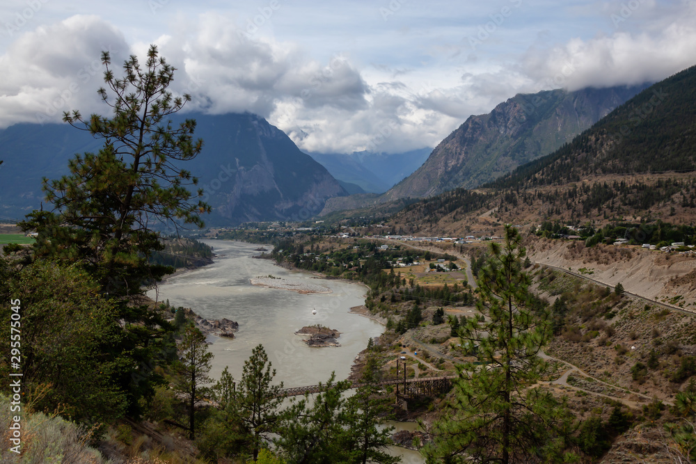 Beautiful View of a small Town, Lillooet, during a sunny and cloudy summer day. Located in the Interior British Columbia, Canada. Beautiful View of a small Town, Lillooet, during a sunny and cloudy summer day. Located in the Interior British Columbia, Canada.