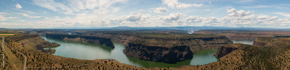 Beautiful Aerial View of The Cove Palisades State Park during a cloudy and sunny summer day. Taken in Oregon, United States of America.