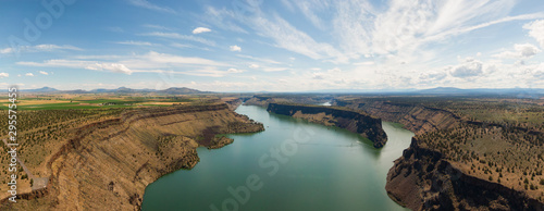 Beautiful Aerial View of The Cove Palisades State Park during a cloudy and sunny summer day. Taken in Oregon, United States of America.