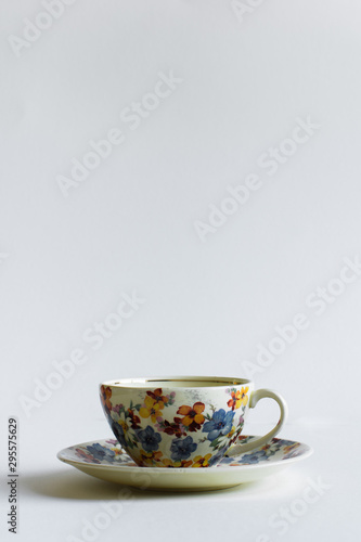 Colorful vintage cup on white background