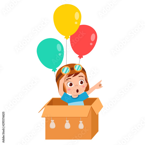 happy kid boy play toy balloon cardboard