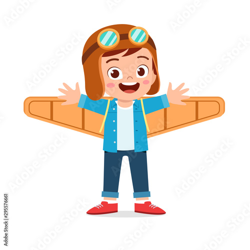 happy kid boy play toy plane cardboard