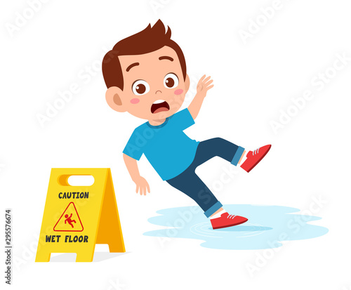 cute kid boy trip on wet floor