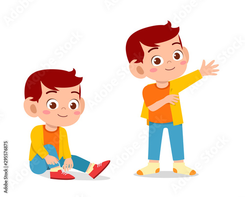 happy cute kid boy do dressing process