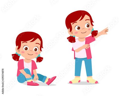 happy cute kid girl do dressing process