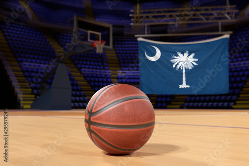South Carolina state flag and basketball on Court Floor © Derek Brumby