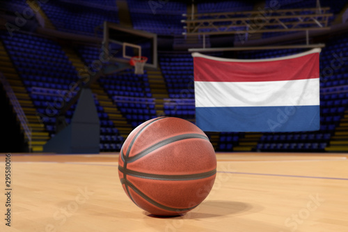 Netherlands flag and basketball on Court Floor