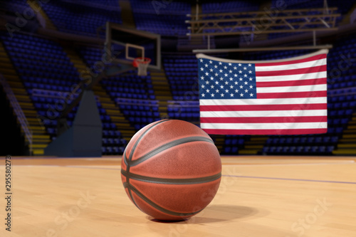 United States flag and basketball on Court Floor