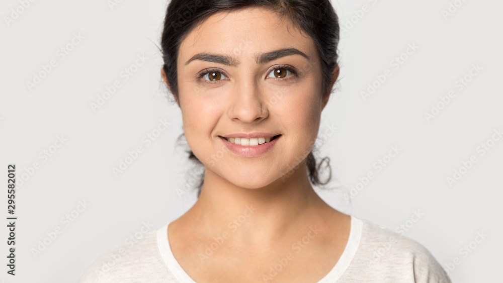 Headshot of indian girl look at camera posing in studio Headshot of indian girl look at camera posing in studio